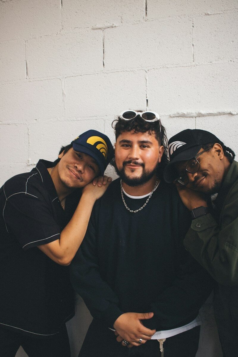 a group of men posing for a picture